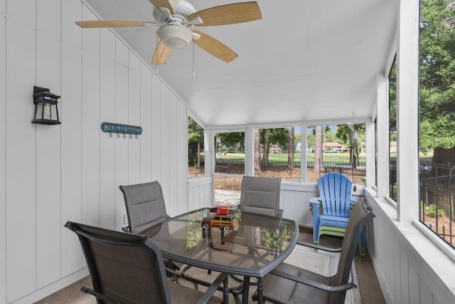 399 Linkside Dr, Miramar Beach, FL 32550 - sunroom with ceiling fan and outdoor dining space