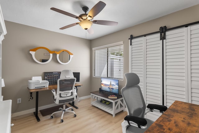 399 Linkside Dr, Miramar Beach, FL 32550 - office area with wood finished floors, ceiling fan, and baseboards