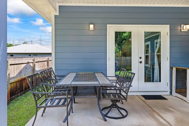 view of patio / terrace featuring outdoor dining space and fence
