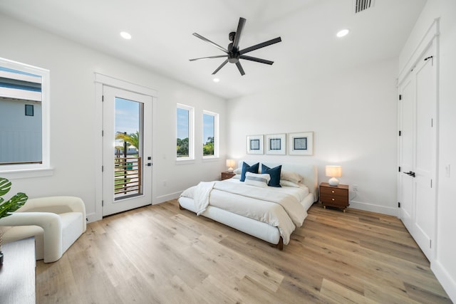 2456 Belmar Ct, Panama City Beach, FL 32408 - bedroom with recessed lighting, access to outside, light wood-type flooring, and visible vents