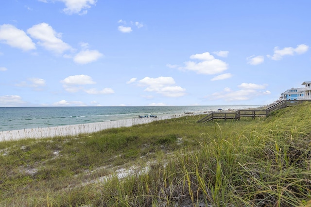 view of water feature with a beach view