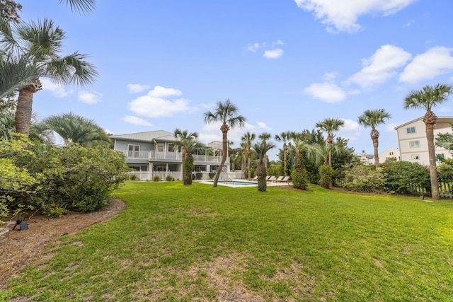 view of yard with an outdoor pool