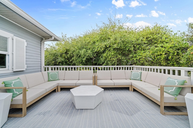 wooden deck featuring an outdoor living space