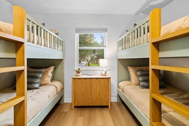 bedroom featuring wood finished floors