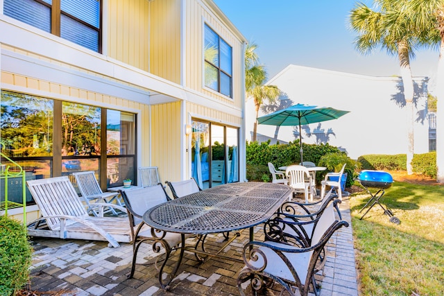 view of patio featuring outdoor dining space