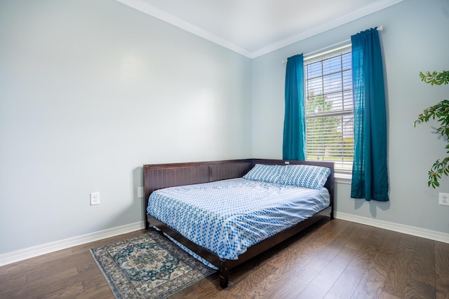508 Boulder St, Crestview, FL 32536 - bedroom with wood finished floors, baseboards, and ornamental molding