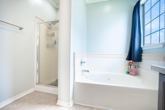 508 Boulder St, Crestview, FL 32536 - full bath featuring a bath, a stall shower, tile patterned floors, and baseboards