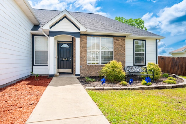 508 Boulder St, Crestview, FL 32536 - entrance to property with brick siding and roof with shingles