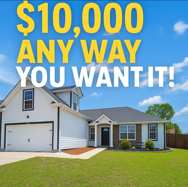 508 Boulder St, Crestview, FL 32536 - view of front of home with driveway, an attached garage, and roof with shingles