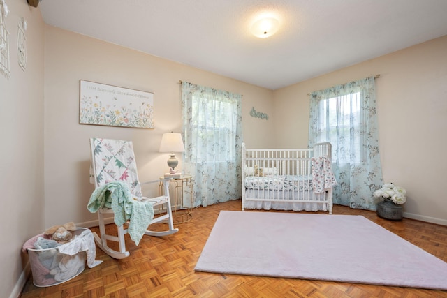 bedroom featuring baseboards