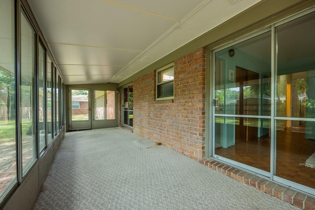 view of unfurnished sunroom