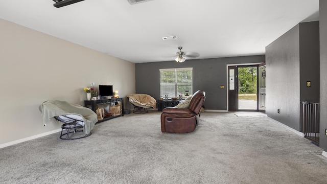 199 W Italian Ave, Defuniak Springs, FL 32433 - carpeted living area featuring ceiling fan and baseboards