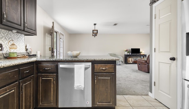 199 W Italian Ave, Defuniak Springs, FL 32433 - kitchen featuring stainless steel dishwasher, dark brown cabinets, decorative backsplash, a peninsula, and light carpet