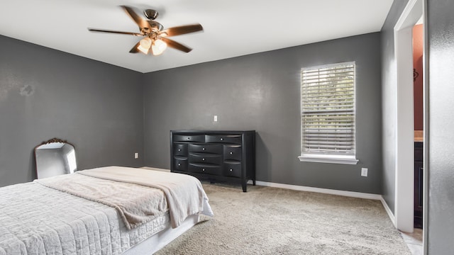 199 W Italian Ave, Defuniak Springs, FL 32433 - carpeted bedroom with baseboards and ceiling fan