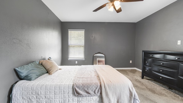 199 W Italian Ave, Defuniak Springs, FL 32433 - bedroom with carpet flooring, baseboards, and a ceiling fan