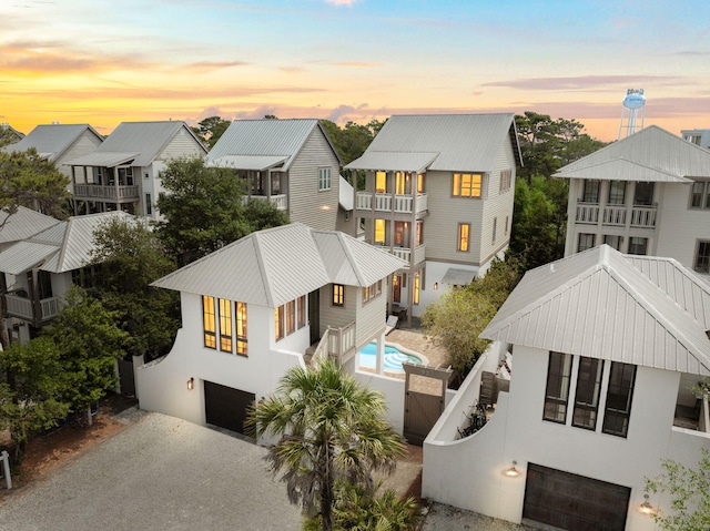 aerial view at dusk with a residential view