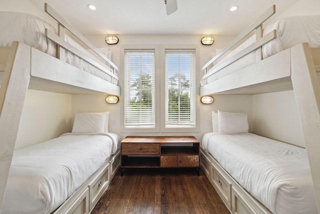 bedroom with dark wood-style flooring and recessed lighting
