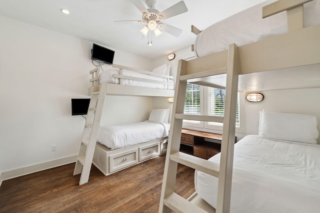 bedroom featuring baseboards, recessed lighting, and wood finished floors