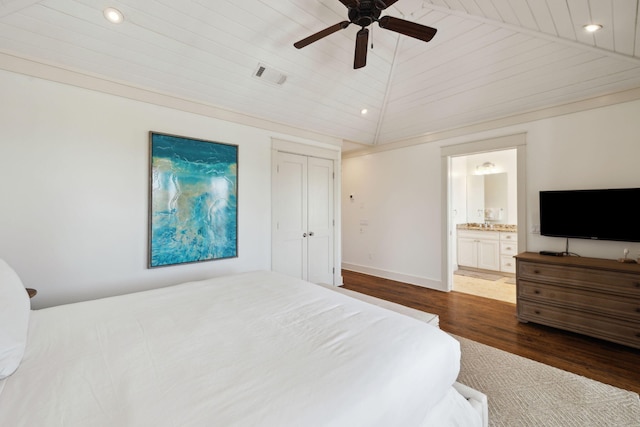 bedroom with recessed lighting, dark wood finished floors, ensuite bathroom, and visible vents