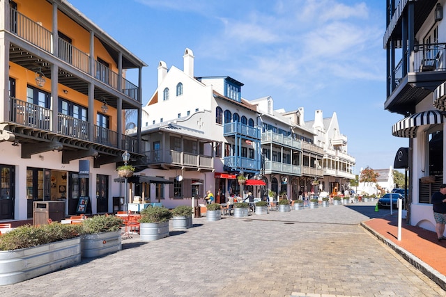 view of street with curbs
