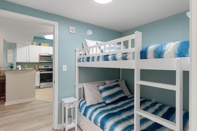 bedroom with light wood-style flooring