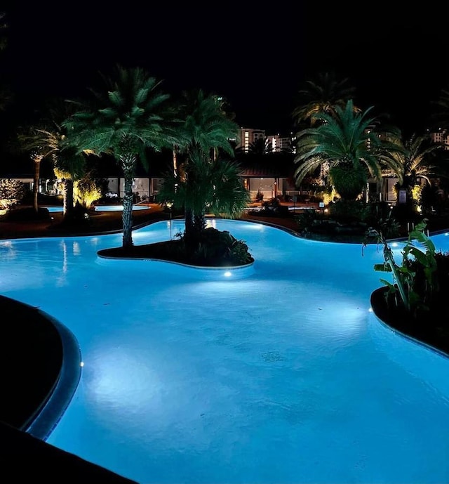 pool at twilight with a community pool