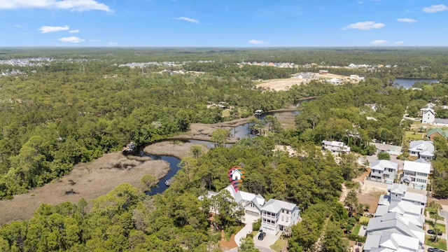 380 N Wall St, Inlet Beach, FL 32461 - aerial perspective of suburban area with a heavily wooded area and a nearby body of water