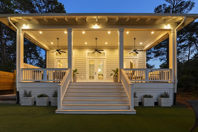 380 N Wall St, Inlet Beach, FL 32461 - back of property featuring ceiling fan, covered porch, and a lawn