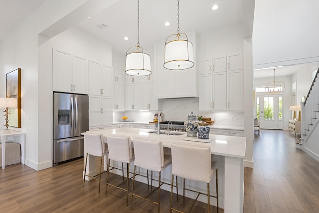 380 N Wall St, Inlet Beach, FL 32461 - kitchen with stainless steel fridge with ice dispenser, recessed lighting, white cabinets, an island with sink, and dark wood finished floors