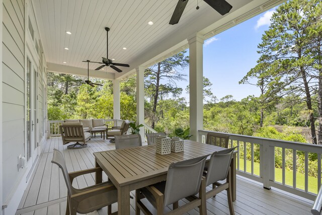 380 N Wall St, Inlet Beach, FL 32461 - wooden deck featuring ceiling fan, outdoor lounge area, and view of scattered trees
