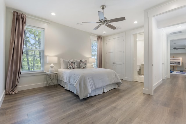 380 N Wall St, Inlet Beach, FL 32461 - bedroom featuring baseboards, light wood-type flooring, recessed lighting, a ceiling fan, and ensuite bathroom
