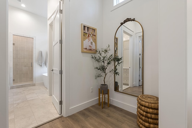 380 N Wall St, Inlet Beach, FL 32461 - hall featuring light wood-style floors, recessed lighting, and baseboards