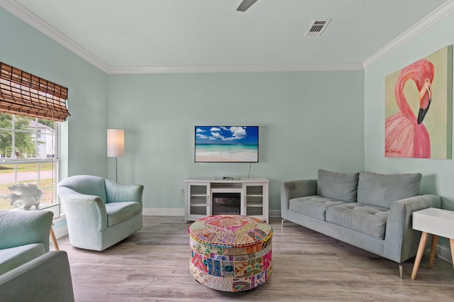114 Rearden Way, Santa Rosa Beach, FL 32459 - living room with ornamental molding, wood finished floors, baseboards, and ceiling fan