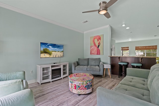 114 Rearden Way, Santa Rosa Beach, FL 32459 - living room with ornamental molding, a ceiling fan, wood finished floors, baseboards, and recessed lighting