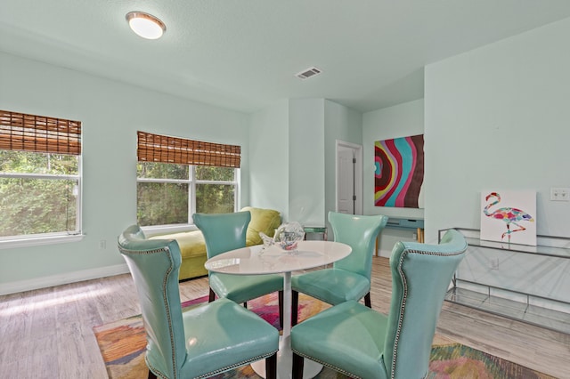 114 Rearden Way, Santa Rosa Beach, FL 32459 - dining space with wood finished floors and baseboards