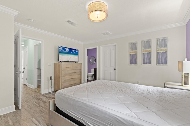 114 Rearden Way, Santa Rosa Beach, FL 32459 - bedroom featuring crown molding, wood finished floors, baseboards, and ensuite bathroom