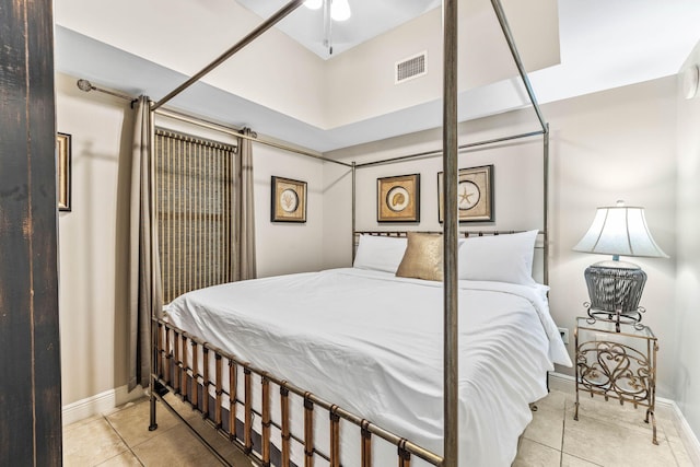 tiled bedroom featuring visible vents and baseboards