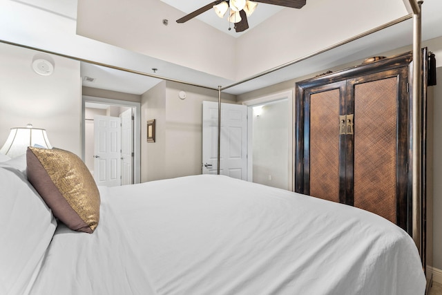 bedroom featuring ceiling fan and visible vents