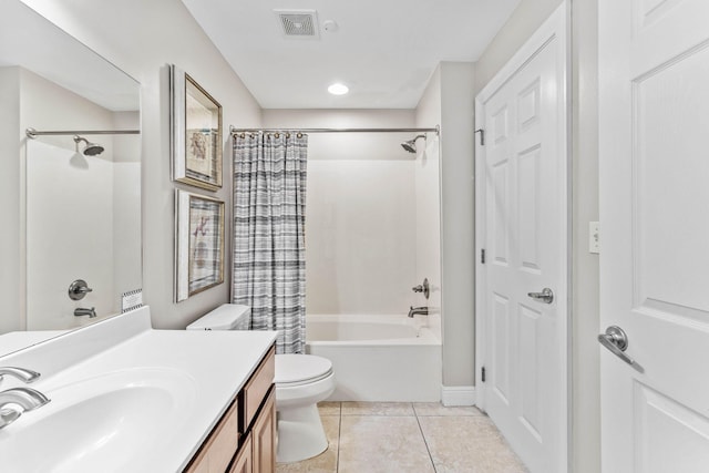 bathroom featuring toilet, visible vents, shower / bath combination with curtain, tile patterned flooring, and vanity