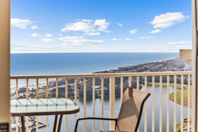 balcony featuring a water view