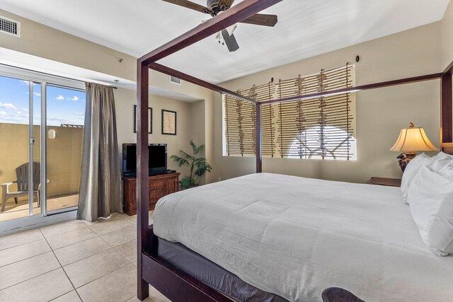 tiled bedroom with visible vents, access to exterior, and ceiling fan