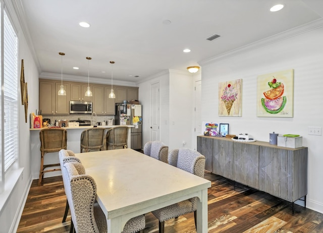 175 Christian Dr, Santa Rosa Beach, FL 32459 - dining area featuring ornamental molding, dark wood-style flooring, recessed lighting, and visible vents