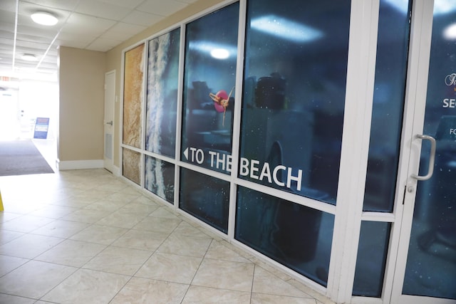 16819 Front Beach Rd Unit 1114, Panama City Beach, FL 32413 - hallway featuring tile patterned floors and baseboards