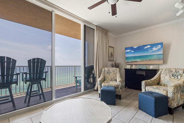 16819 Front Beach Rd Unit 1114, Panama City Beach, FL 32413 - living area with ceiling fan, crown molding, and floor to ceiling windows