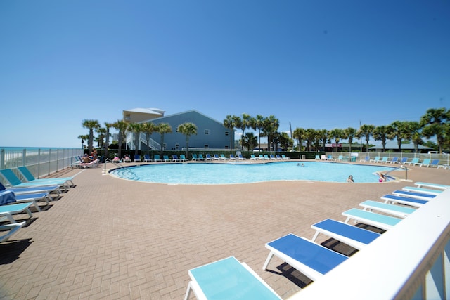 16819 Front Beach Rd Unit 2415, Panama City Beach, FL 32413 - community pool featuring a patio