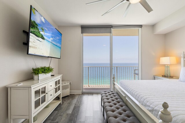 16819 Front Beach Rd Unit 2415, Panama City Beach, FL 32413 - bedroom featuring expansive windows, dark wood finished floors, access to exterior, baseboards, and ceiling fan