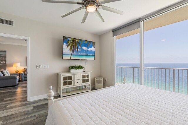 16819 Front Beach Rd Unit 2415, Panama City Beach, FL 32413 - bedroom featuring wood finished floors, baseboards, and ceiling fan