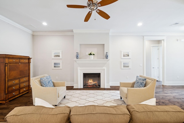 180 Blakely Drew Blvd, Santa Rosa Beach, FL 32459 - living area featuring ornamental molding, a ceiling fan, a warm lit fireplace, baseboards, and recessed lighting