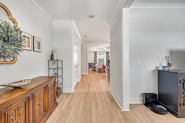 2108 Royal Tern St, Panama City, FL 32405 - corridor featuring crown molding, baseboards, visible vents, and light wood-type flooring