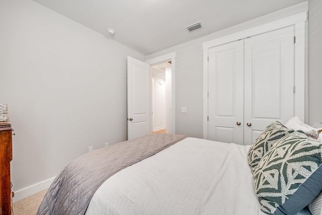 2108 Royal Tern St, Panama City, FL 32405 - bedroom featuring carpet floors, baseboards, visible vents, and a closet